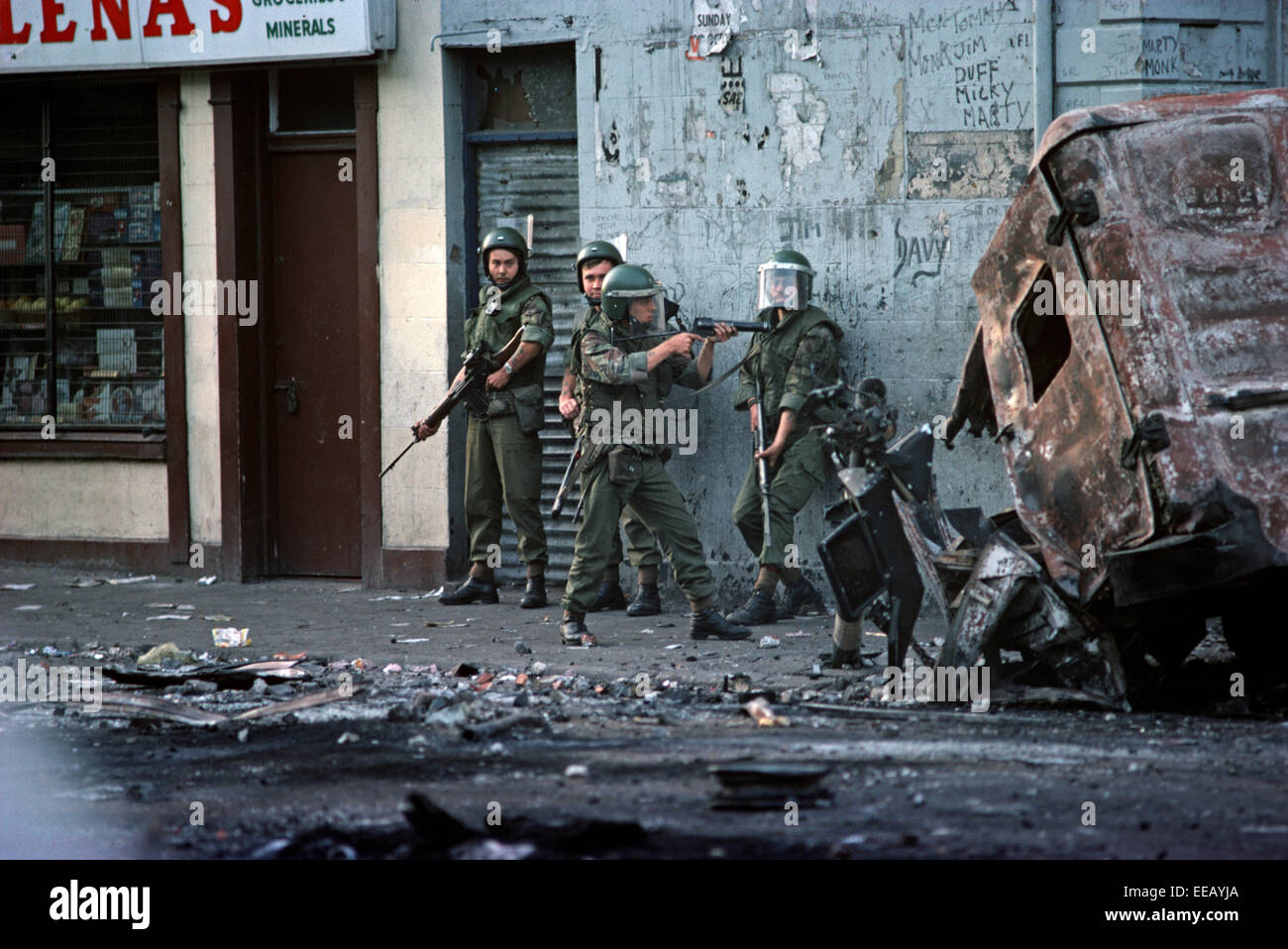 BELFAST, NORTHERN IRELAND - AUGUST 1976, British Army Troops during Rioting on the Falls Road, West Belfast, The Troubles, Northern Ireland. Stock Photo
