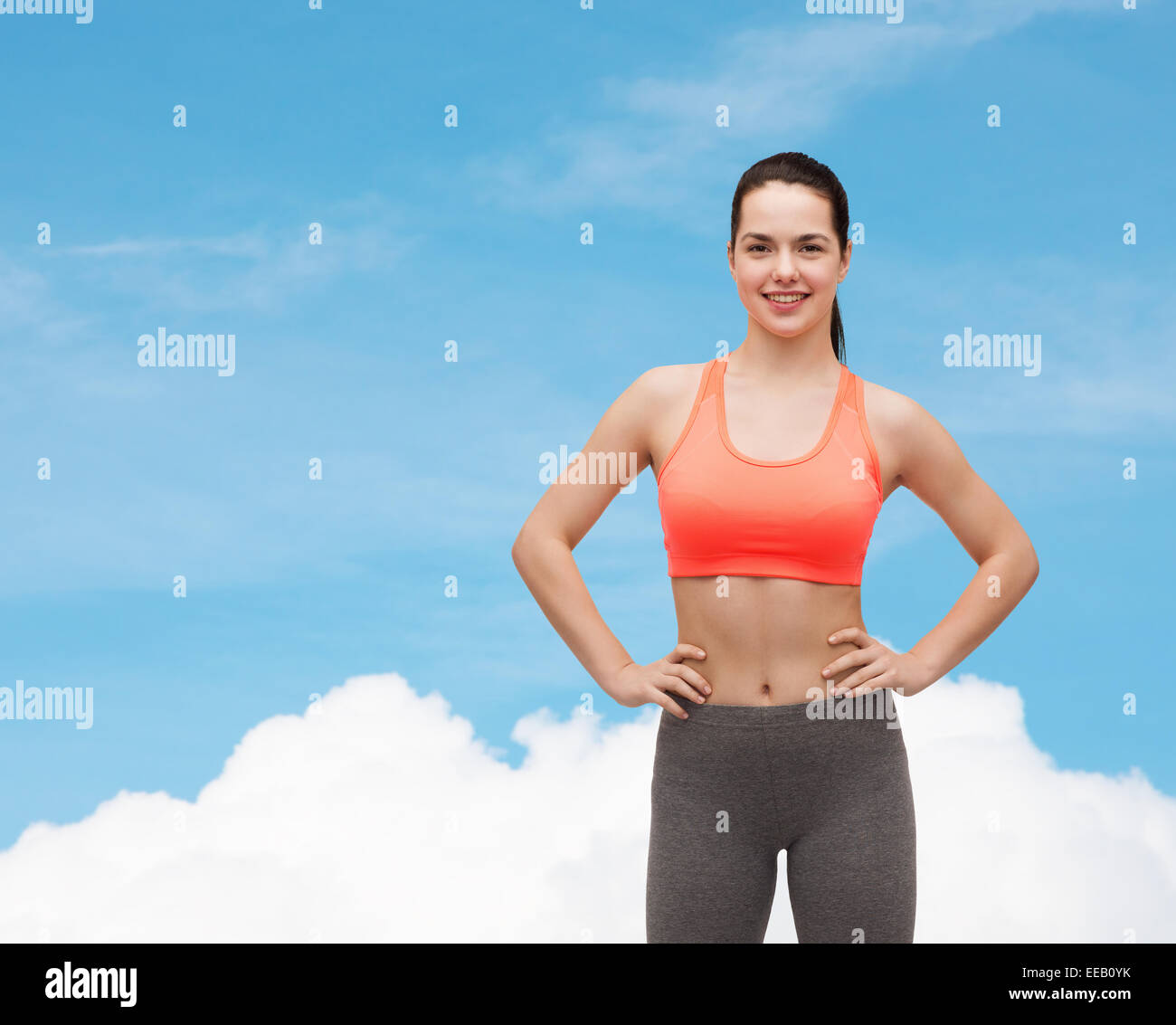 smiling teenage girl in sportswear Stock Photo