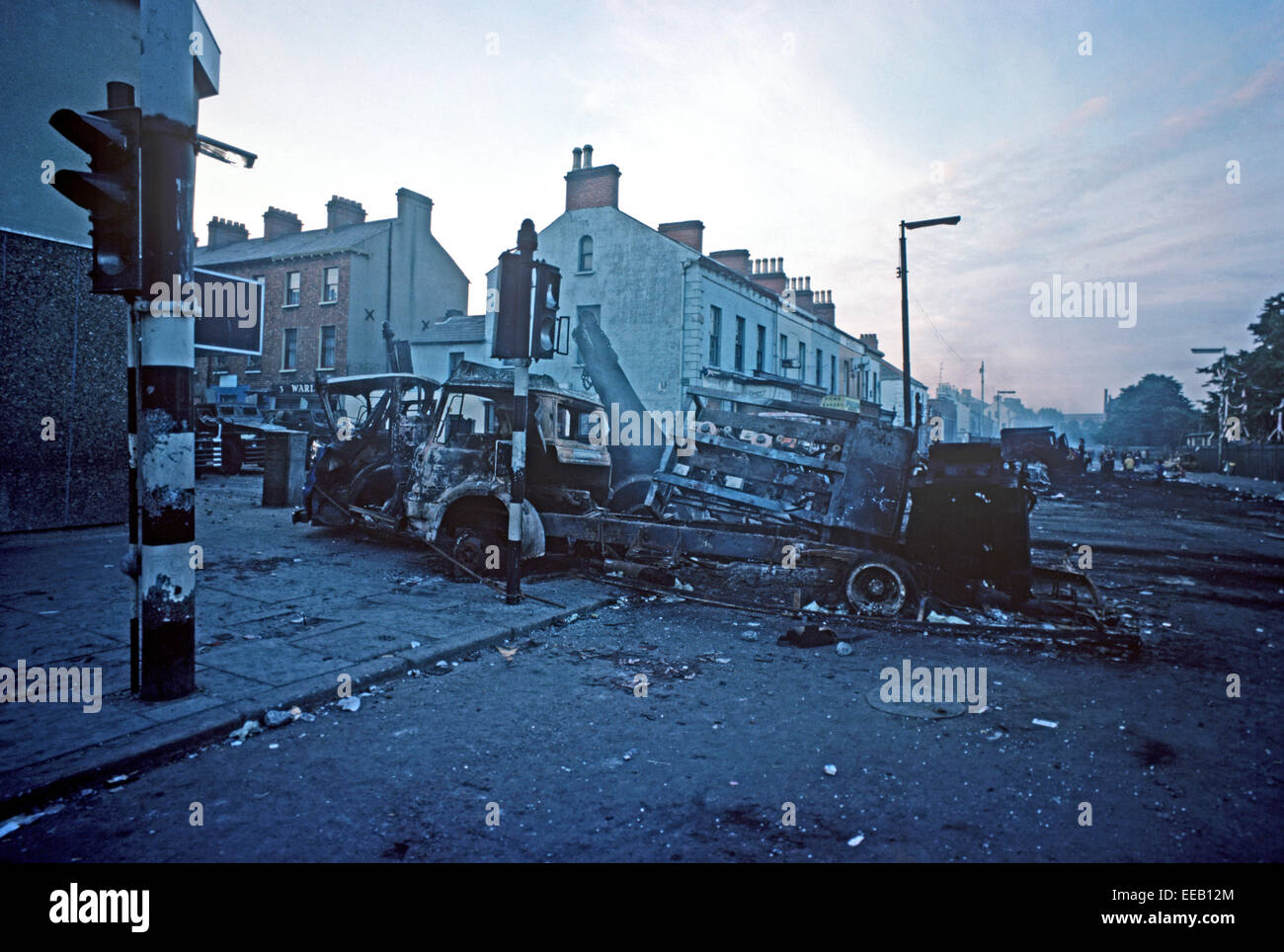 BELFAST, NORTHERN IRELAND - August 1976.. Morning after a night of Riots in the Falls Road, West Belfast during The Troubles, Northern Ireland. Stock Photo