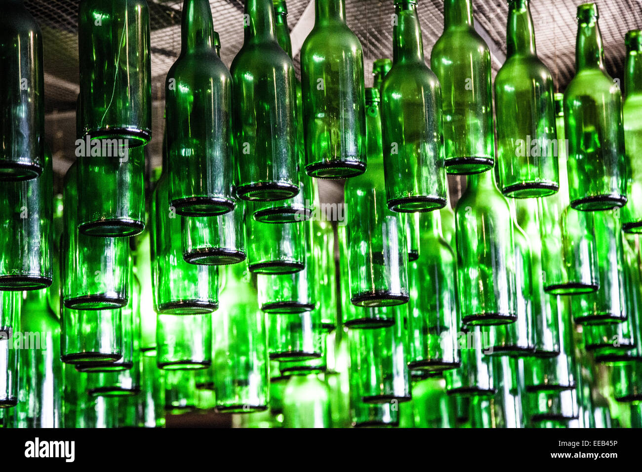 bottles of cider as decoration on a typical bar in Gijon, Asturias