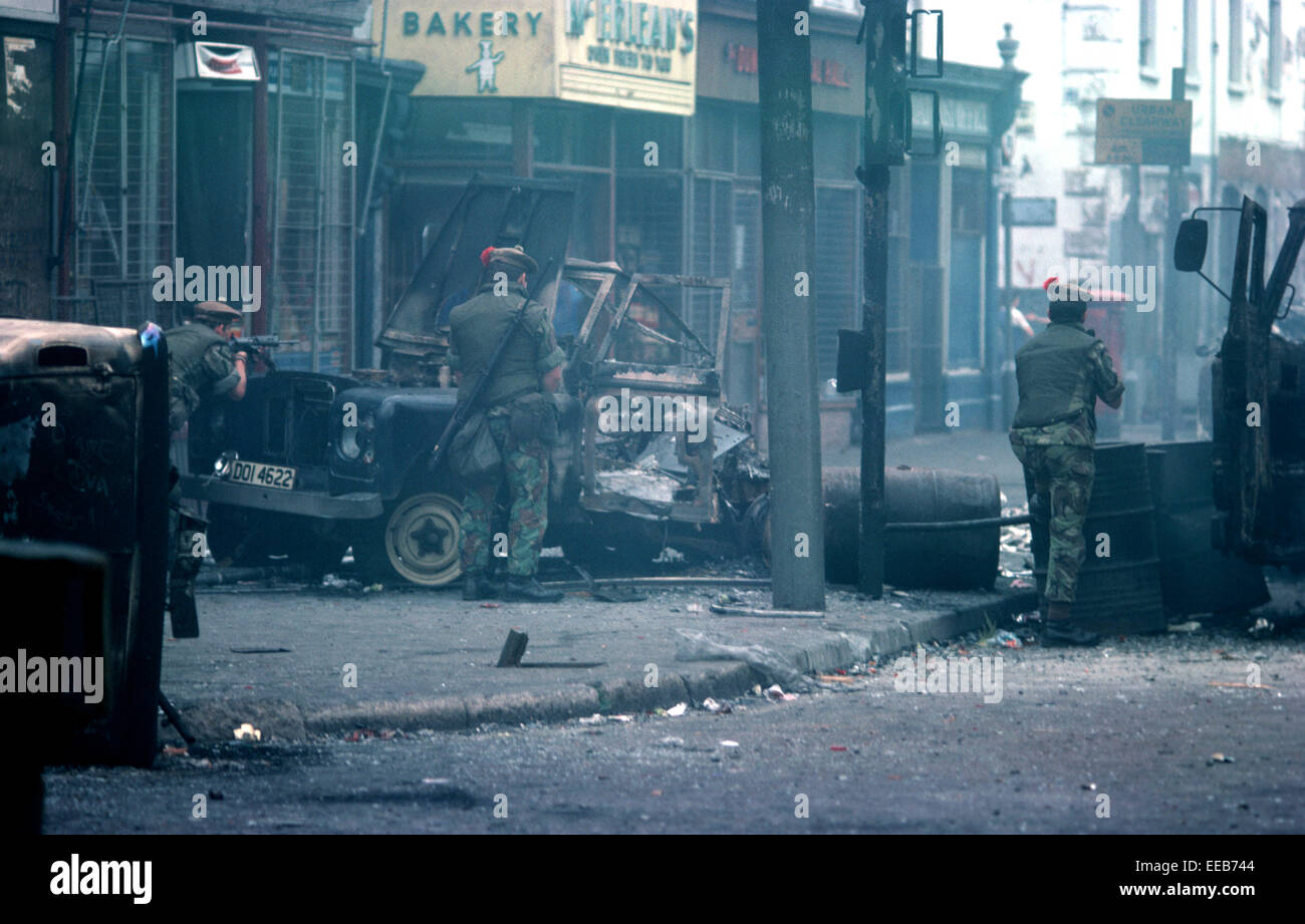 BELFAST, NORTHERN IRELAND - AUGUST 1976, British Army Troops during Rioting on the Falls Road, West Belfast, The Troubles, Northern Ireland. Stock Photo