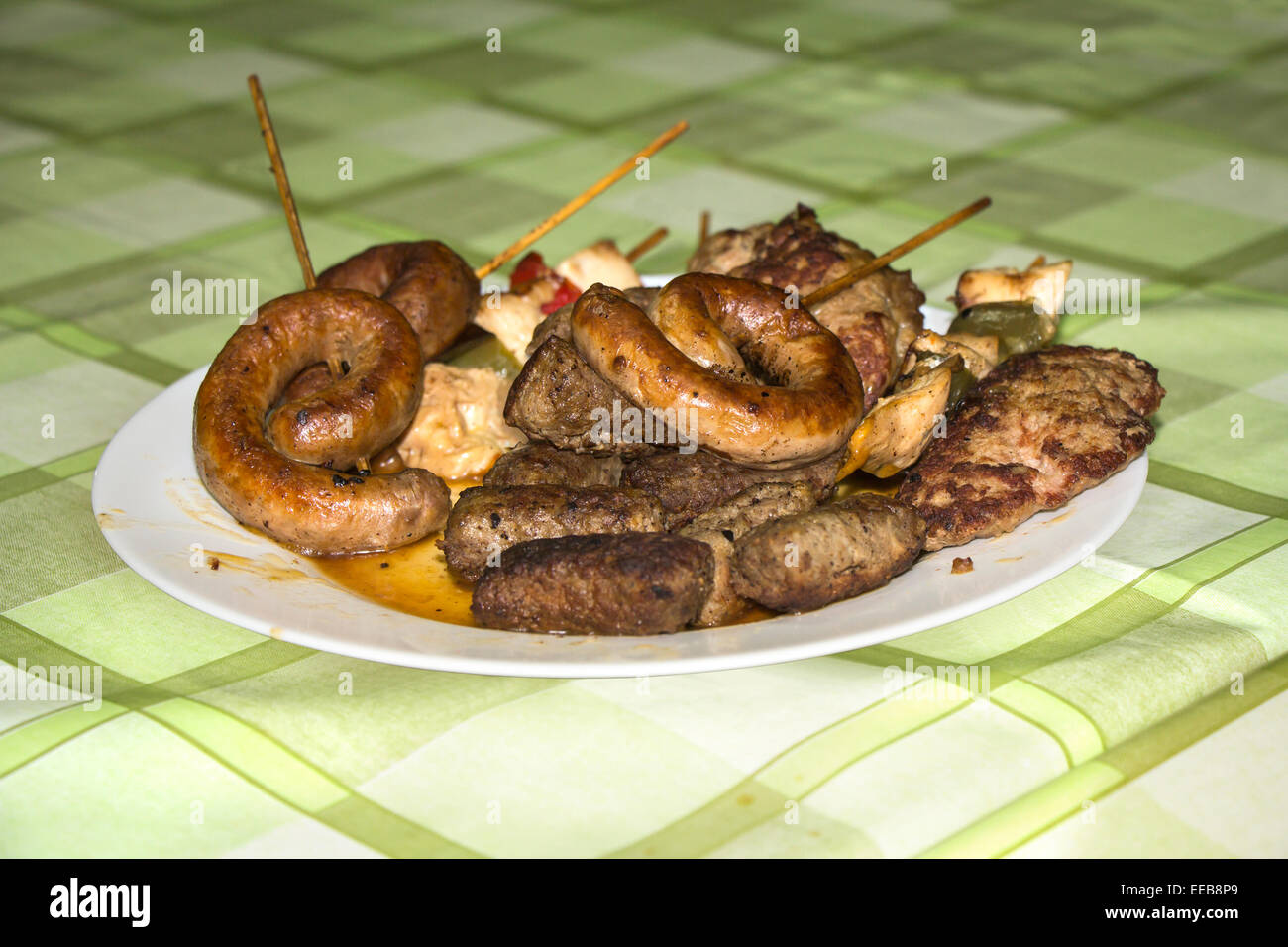 Sausage steak mixed meat grilled on a plate Stock Photo