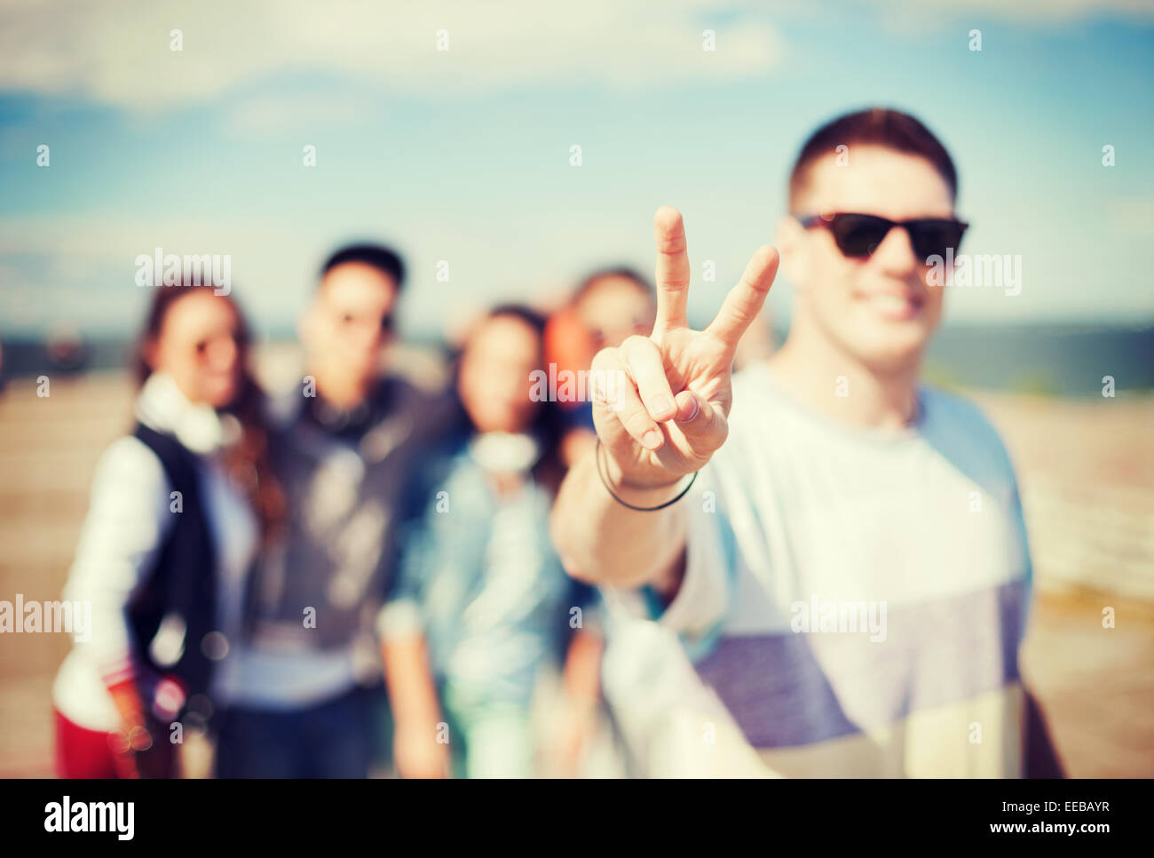 close up of male hand showing v-sign with fingers Stock Photo