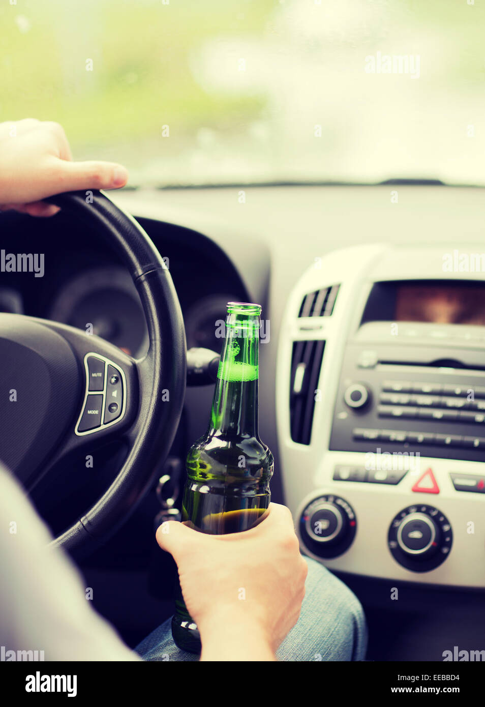 man drinking alcohol while driving the car Stock Photo - Alamy