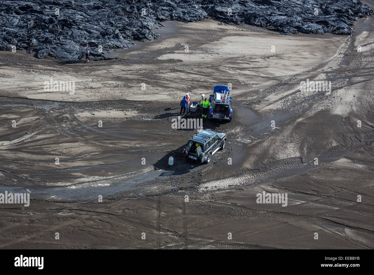 Aerial view of scientists and their jeeps by the lava flows. Holuhraun, Bardarbunga Volcano, Iceland Stock Photo