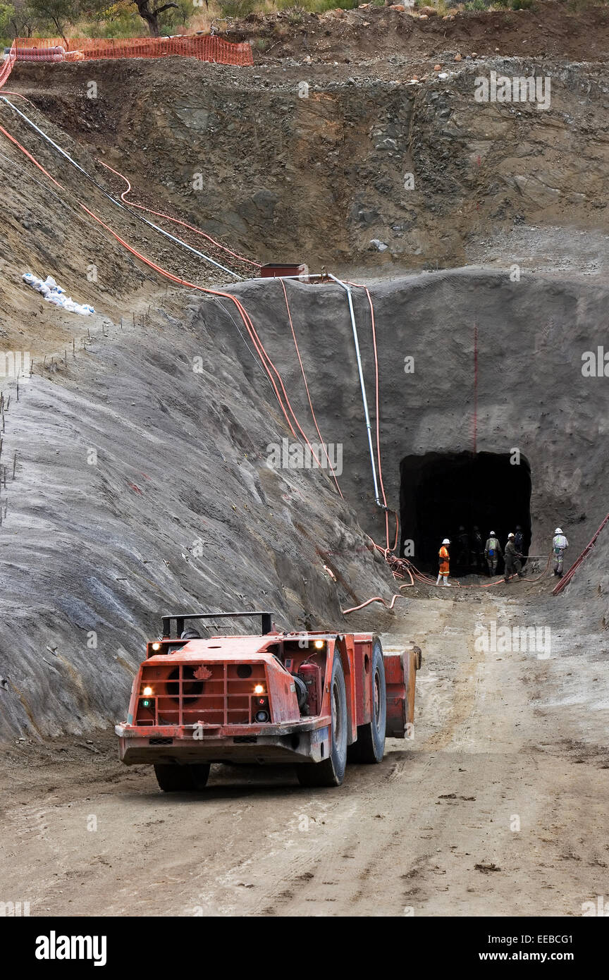 Load Haul Dump or LHD vehicle coming out of new platinum mine during building safe area around entrance portal in South Africa Stock Photo