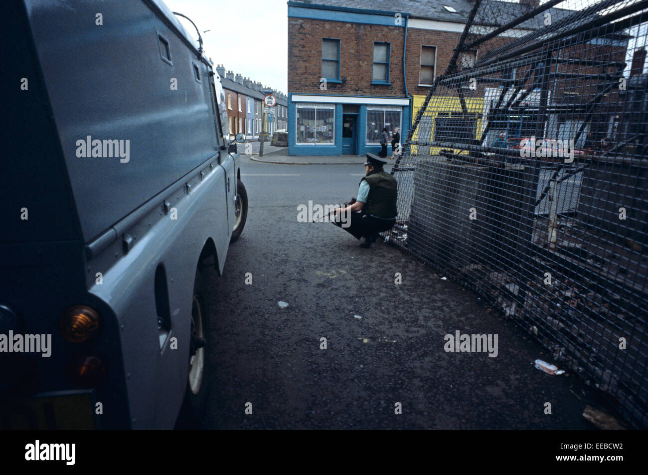 BELFAST, NORTHERN IRELAND, SEPTEMBER 1978. RUC, Royal Ulster Constabulary Policeman on Patrol outside Fortified Police Station in West Belfast during The Troubles, Northern Ireland. Stock Photo