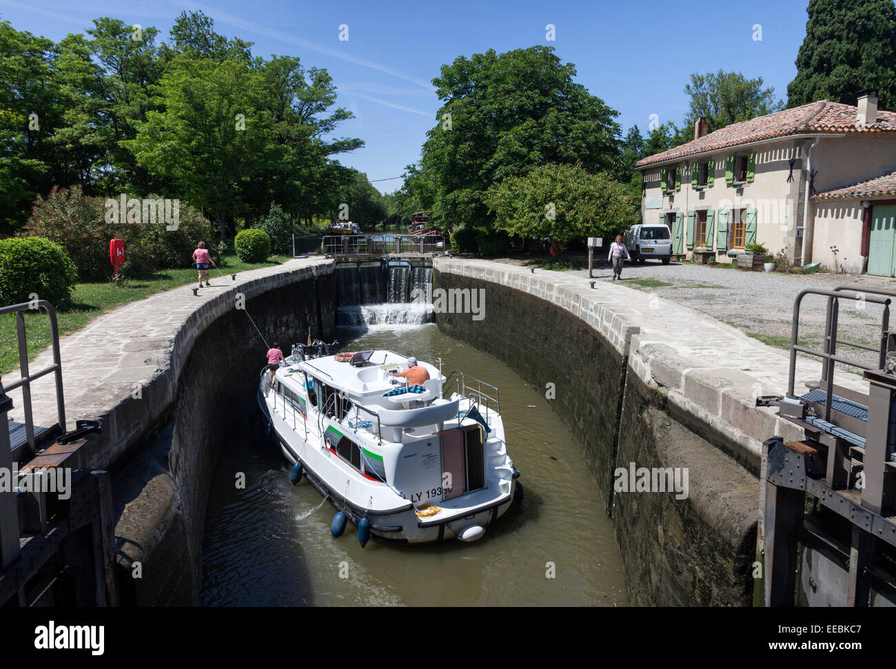 Boat Navigating a Lock on the Canal Du Midi Near Carcasonne France Stock Photo