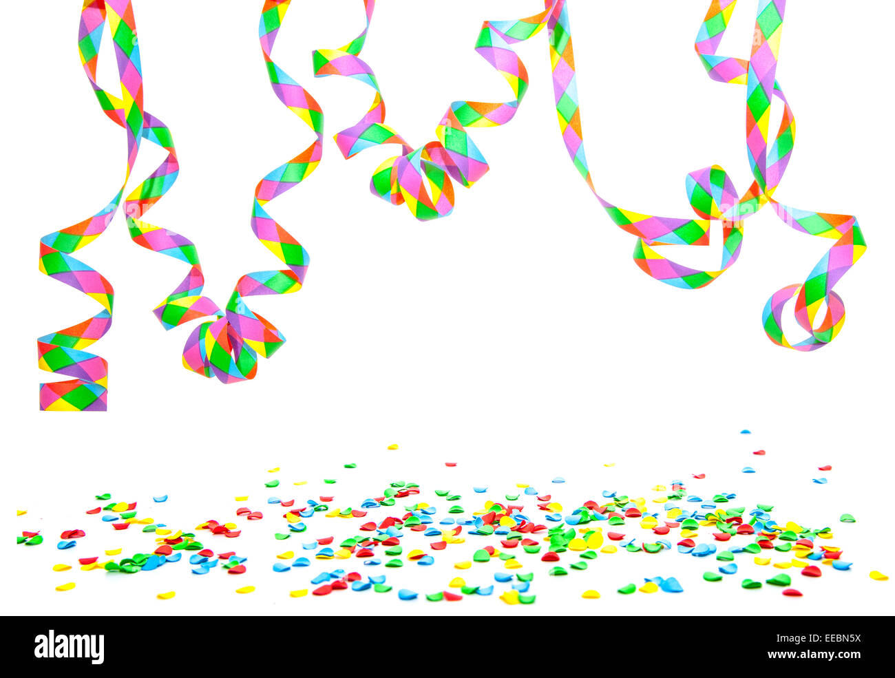 Confetti and party streamer on white background Stock Photo