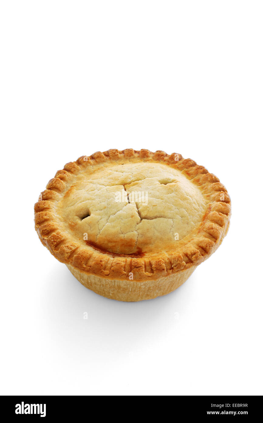 A savoury meat pie with shortcrust pastry on a white background Stock