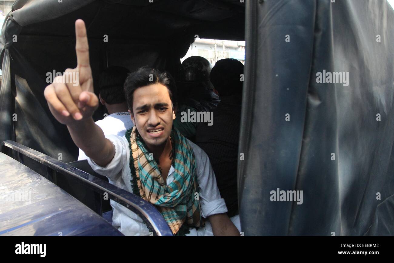Dhaka, Bangladesh. 15th January, 2015. Bangladeshi Islamic activists arrest and shout slogun outside the Bangladesh National Mosque during a protest in Dhaka, Bangladesh, Thursday, Jan. 15, 2015. The protest was against Bangladeshi Prime Minister and leader of the Awami League party Sheikh Hasina and former telecommunication minister Abdul Latif Siddique after his alleged anti-Islam comments at a rally. Photo: Monirul Alam © Monirul Alam/ZUMA Wire/Alamy Live News Stock Photo