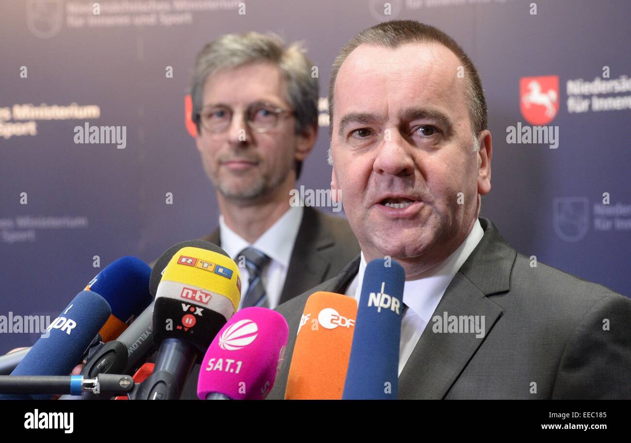 Interior Minister of Lower Saxony, Boris Pistorius (R, SPD), and the president of the state criminal investigation department (LKA) Lower Saxony, Uwe Kolmey, speak at a press conference at the Ministry of the Interior in Hanover, Germany, 15 January 2015. The safety authorities investigate on about 15 suspect Islamists, who are on their way to join the rebel group ISIS in Syria. According to 'Bild-Zeitung' informations, the islamistic scene in Wolfsburg, which is occupied by authorities, contains about 50 IS terror group supporters. PHOTO: JULIAN STRATENSCHULTE/dpa Stock Photo