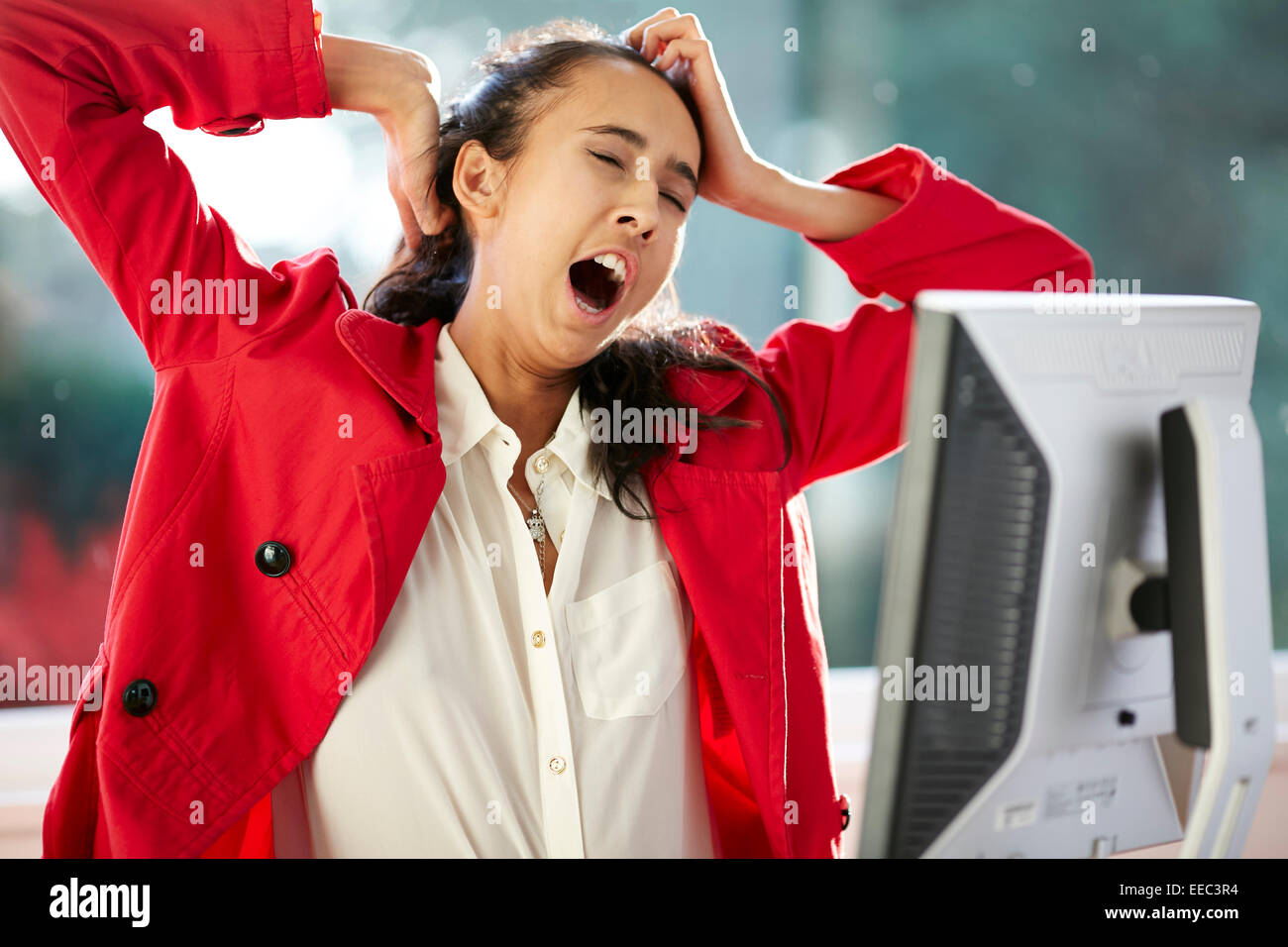 Girl bored at work Stock Photo Alamy