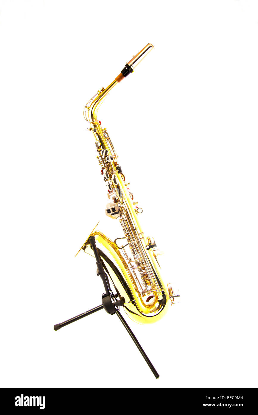 saxophone brass instrument on stand music keys side on cut out copy space white background saxaphone Stock Photo