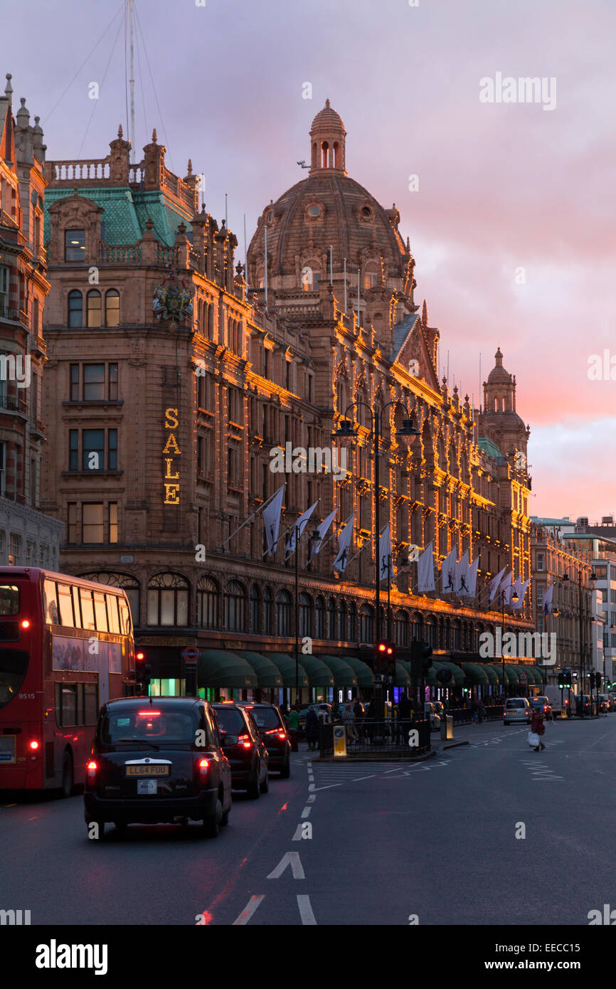 London sunset; sun setting on Harrods department store, Knightsbridge London UK Stock Photo