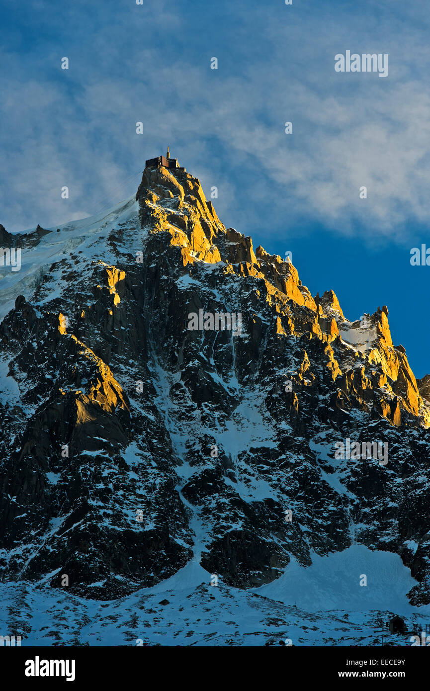 Aiguille du Midi in the evening sun in winter, Mont Blanc massif ...
