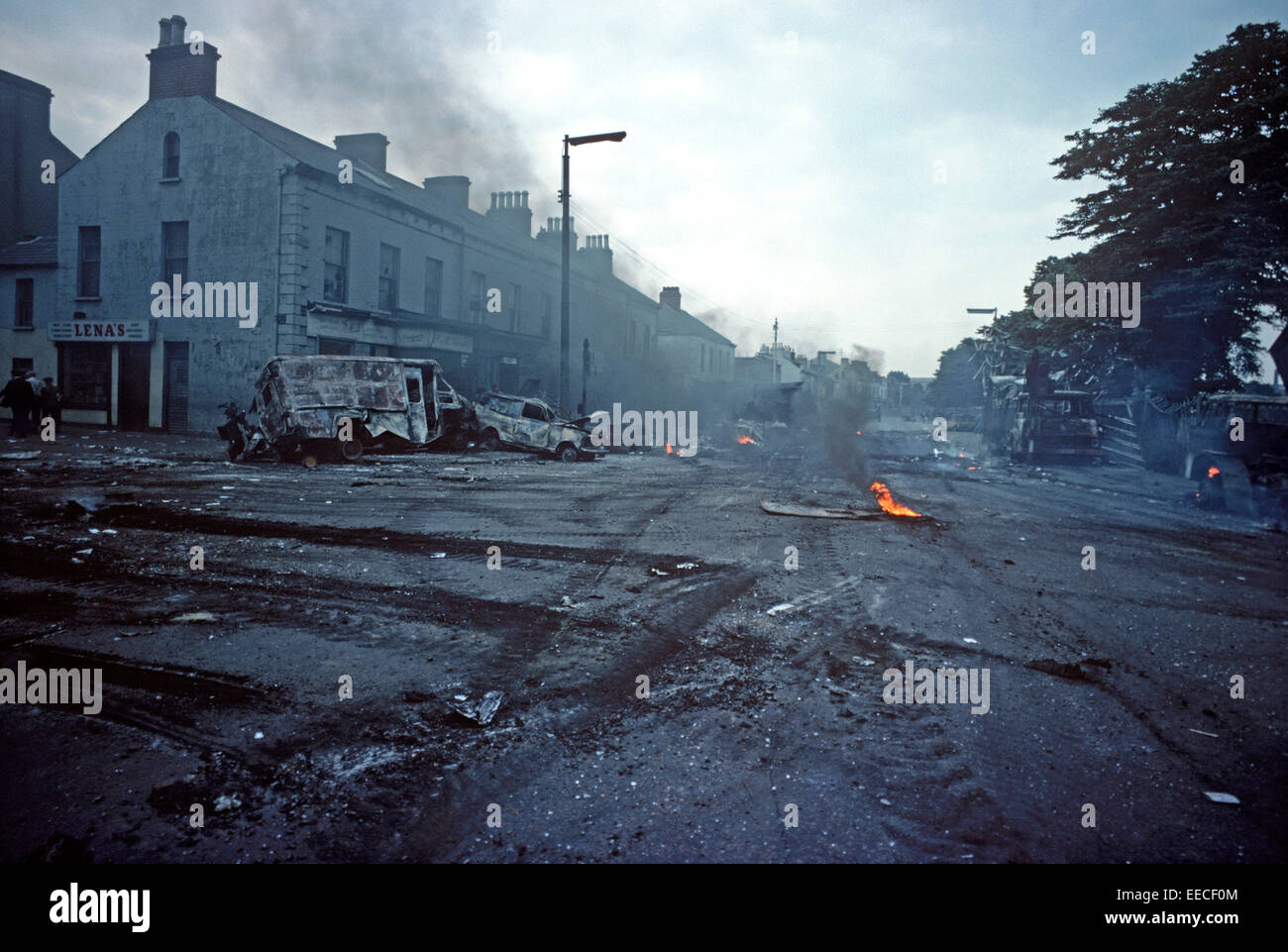 BELFAST, NORTHERN IRELAND - August 1976.. Morning after a night of Riots in the Falls Road, West Belfast during The Troubles, Northern Ireland. Stock Photo