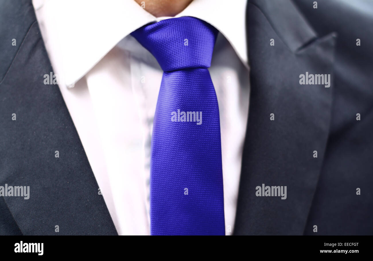 Business man in blue suit hi-res stock photography and images - Alamy