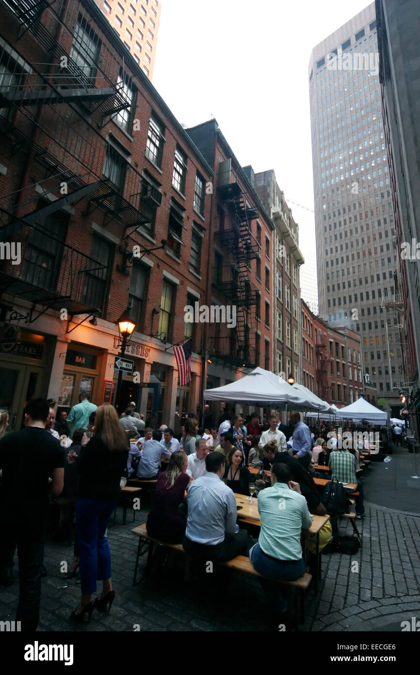 People sitting at a busy outdoor restaurant at Pearl Street on Friday ...