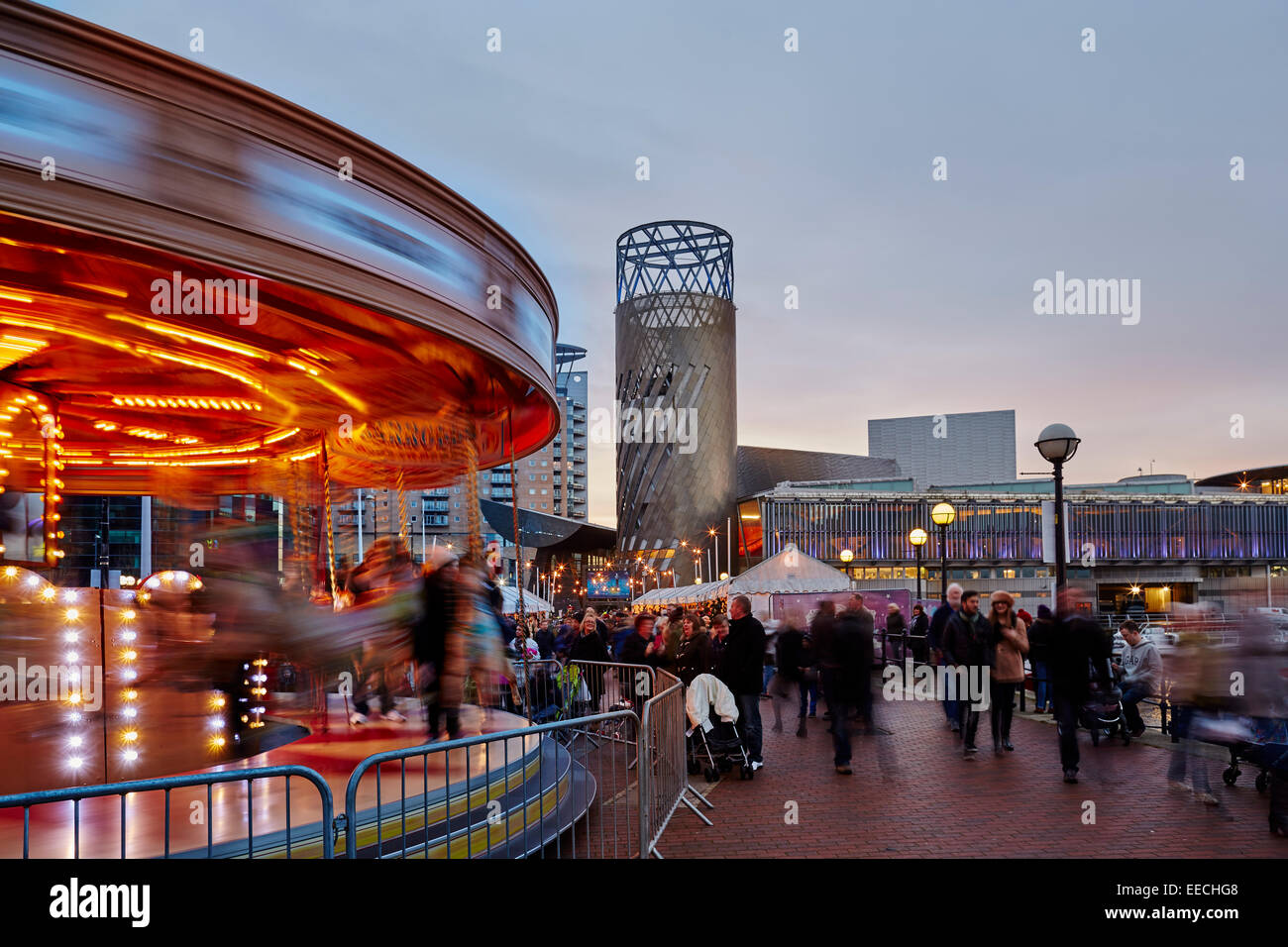 Lowry Outlet at Media City in Salford Quays, Victorian Christmas Market  framed by Lowry Theater Stock Photo - Alamy