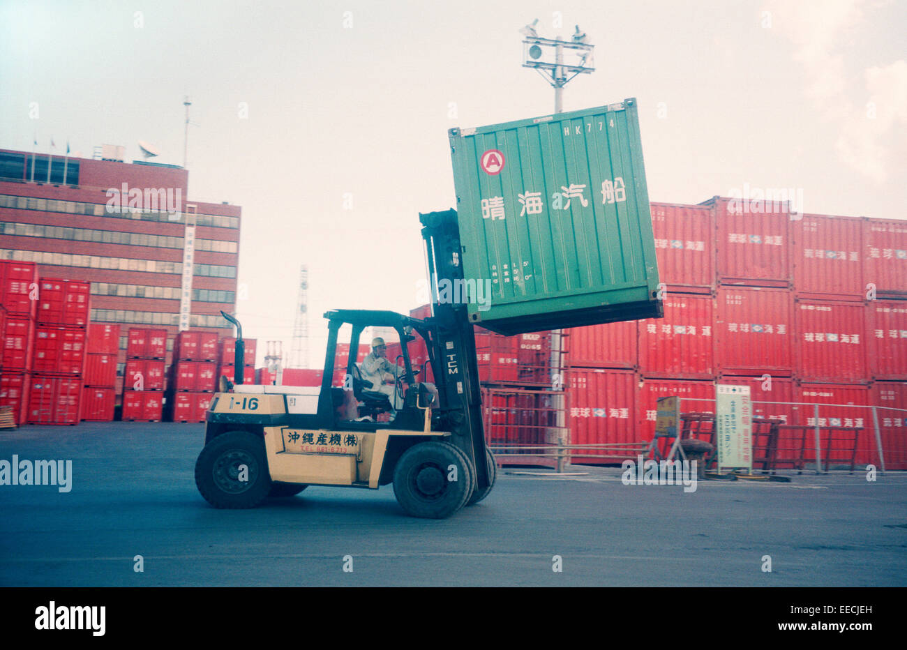 Cargo containers being transported in the seaside port in Tokio, Japan Stock Photo Alamy