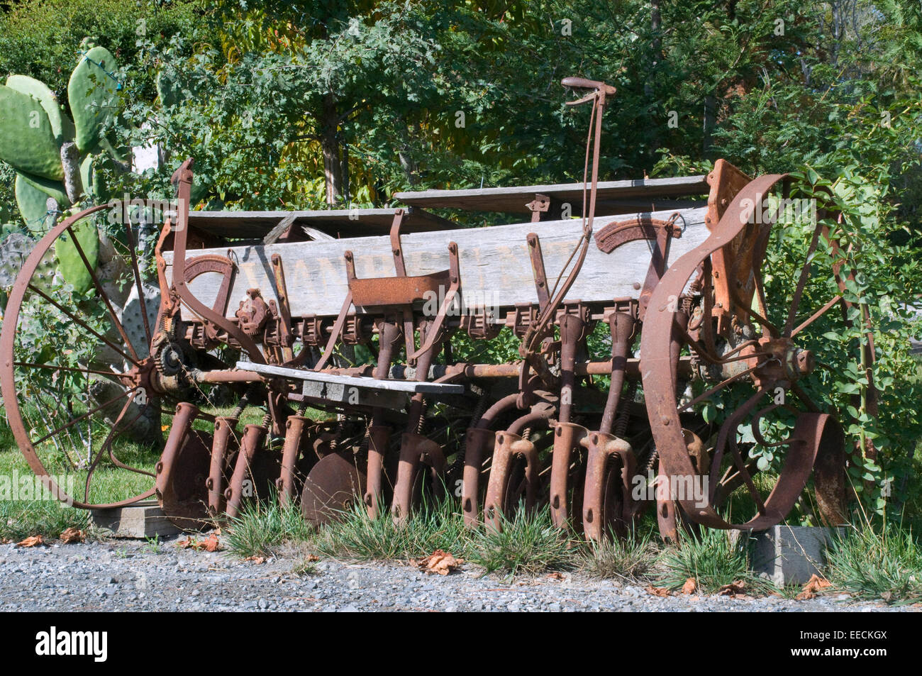 Antiquated abandoned 1930's horse drawn agricultural harrower antique farm equipment Stock Photo