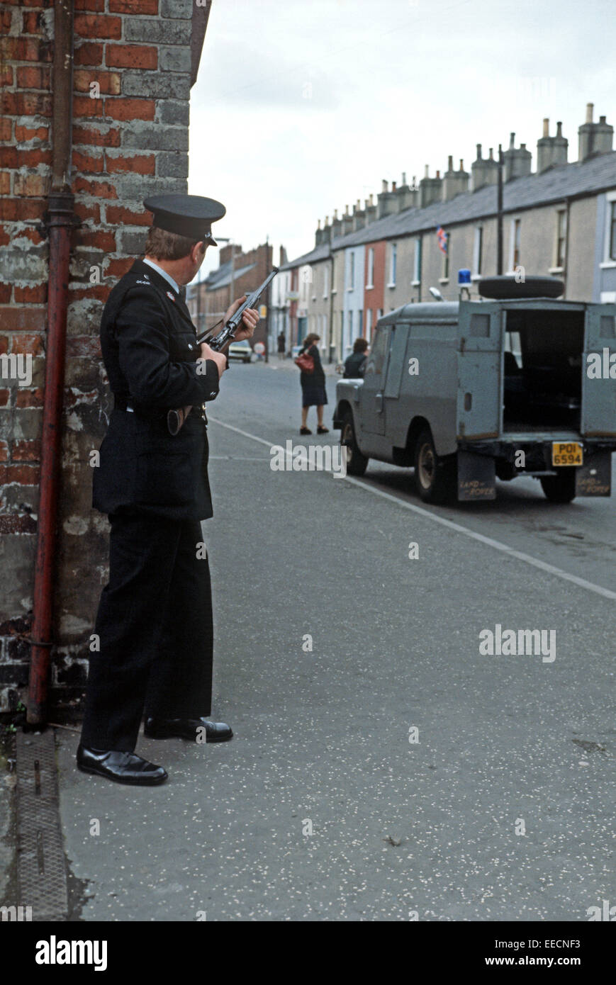 BELFAST, UNITED KINGDOM - SEPTEMBER 1978. RUC, Royal Ulster Constabulary, policeman on Patrol of East Belfast Streets during The Troubles, Northern Ireland. Stock Photo