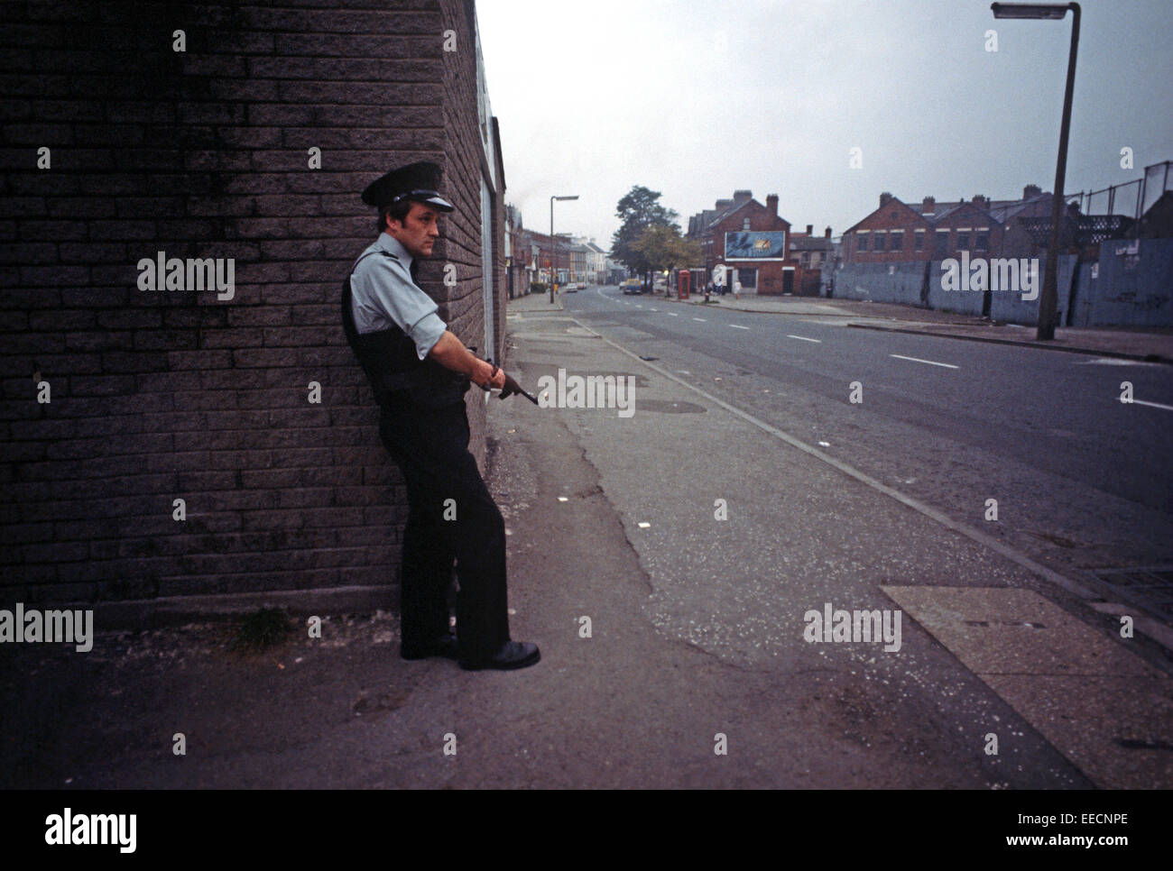 BELFAST, UNITED KINGDOM - SEPTEMBER 1978. RUC, Royal Ulster Constabulary, policeman on Patrol of East Belfast Streets during The Troubles, Northern Ireland. Stock Photo