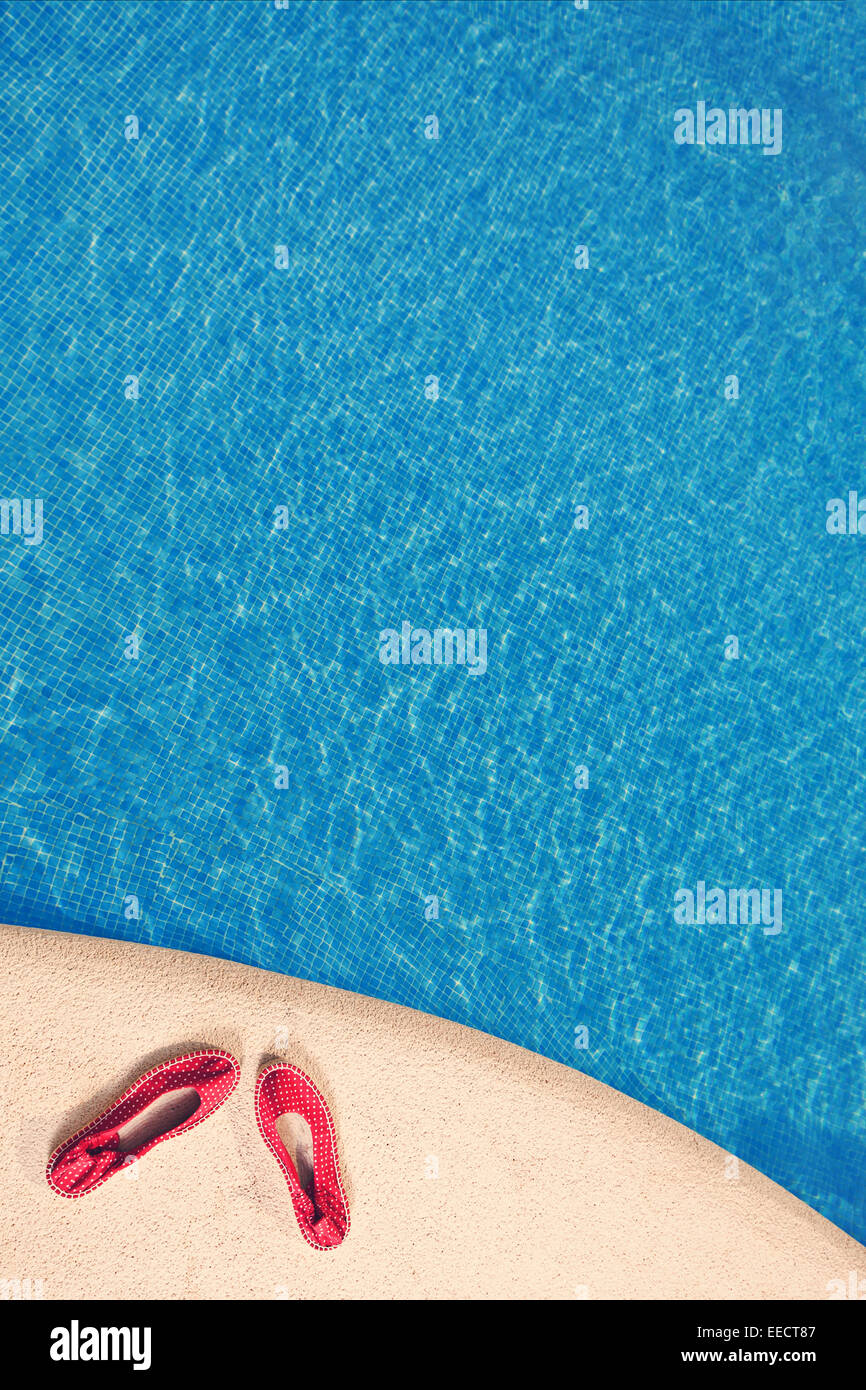 Shoes by Swimming Pool Stock Photo