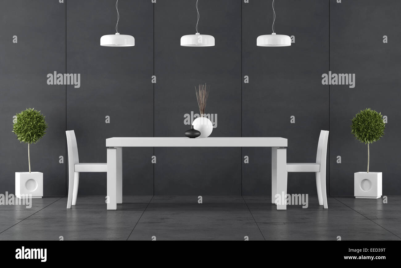 Black dining room with wall blackboard paneling and white table with ...