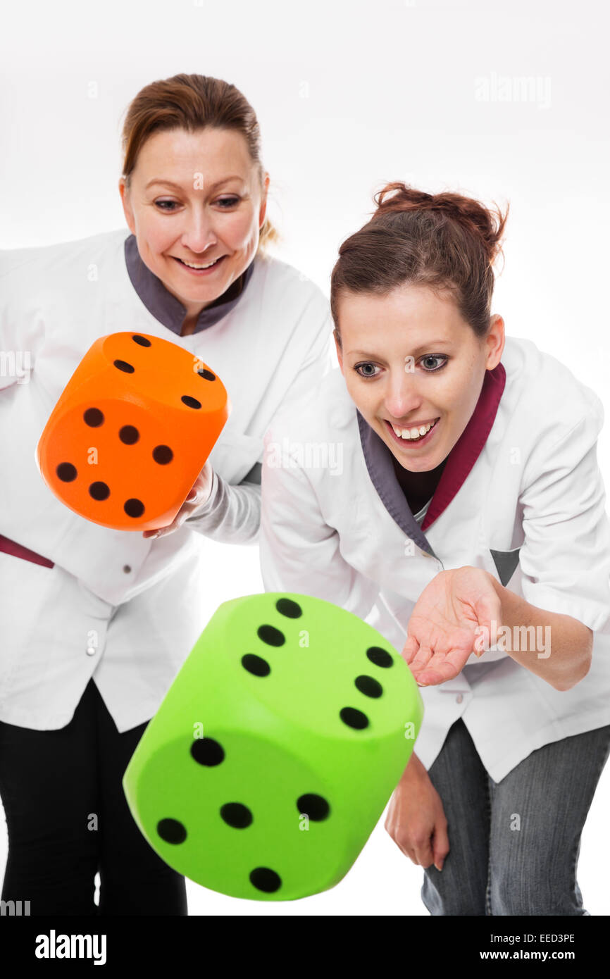 two female nurses concept home care and teamwork Stock Photo
