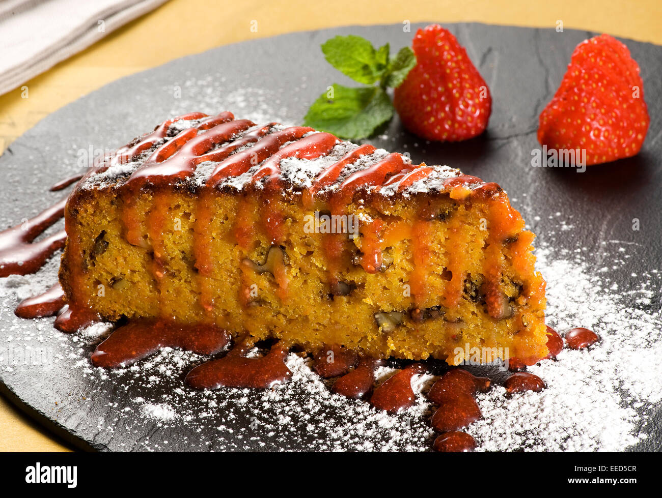 Slice of delicious fresh carrot cake Stock Photo