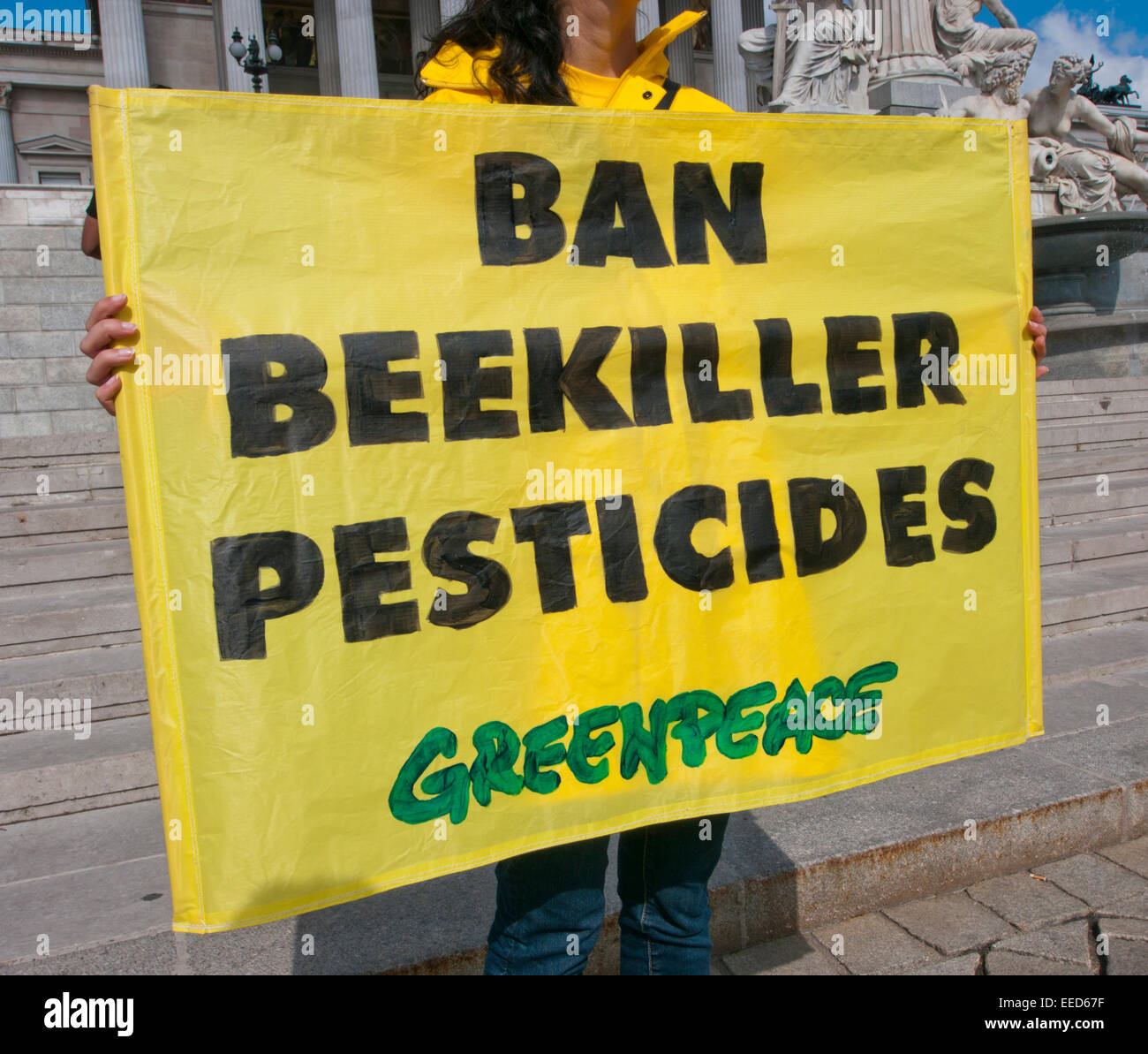 Ban Bee killer Pesticides, Greenpeace sign Stock Photo