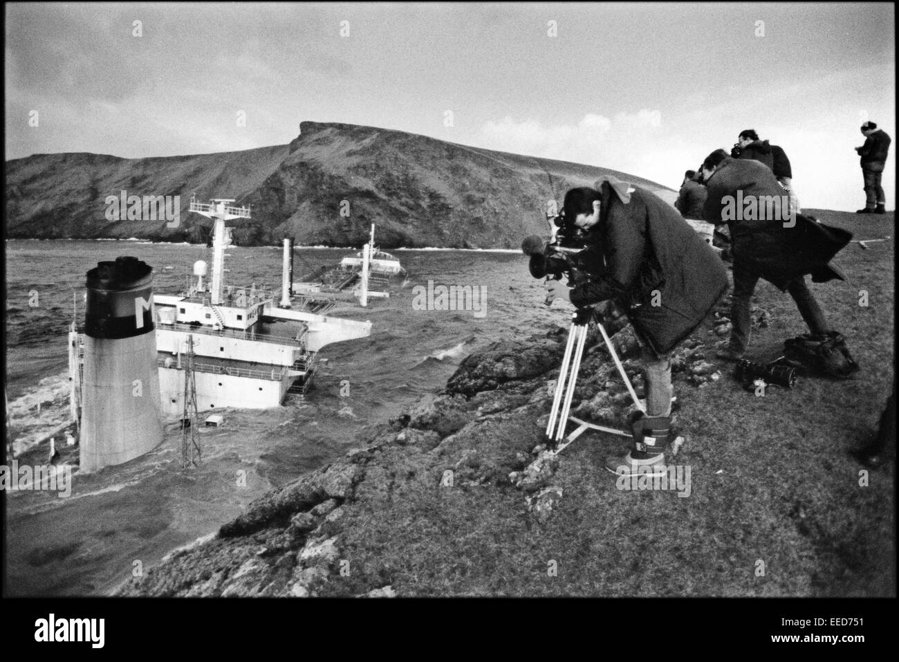 Braer disaster. Media film the wreck on the rocks at Quendale Shetland ...