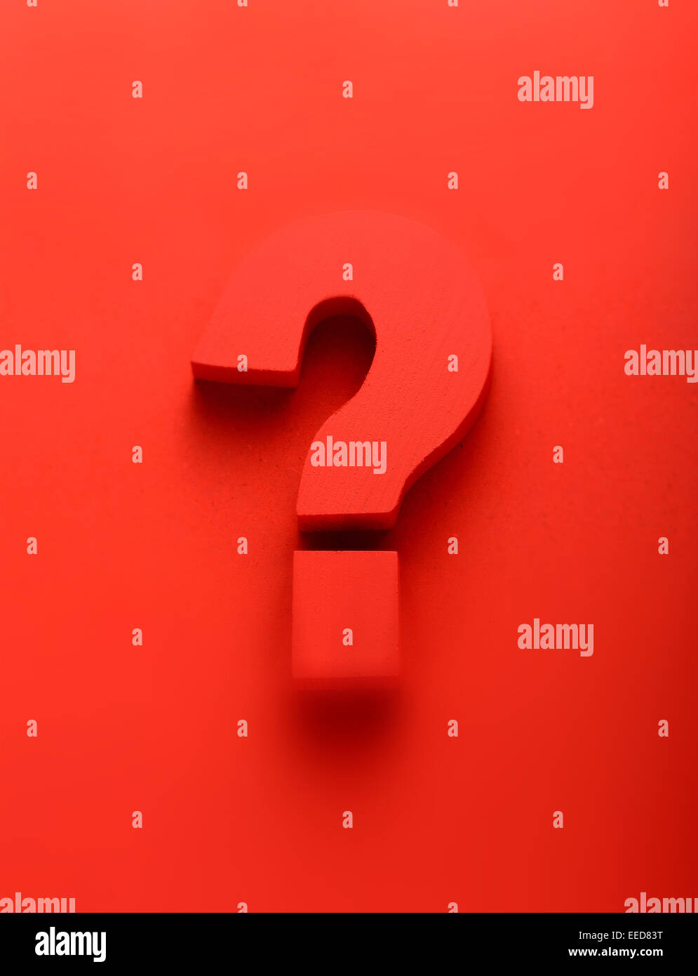 Red question mark on a red background Stock Photo