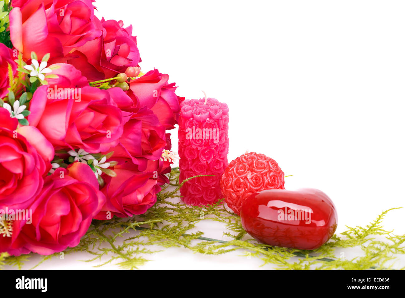 Candles, roses and glass heart isolated on white background Stock Photo ...