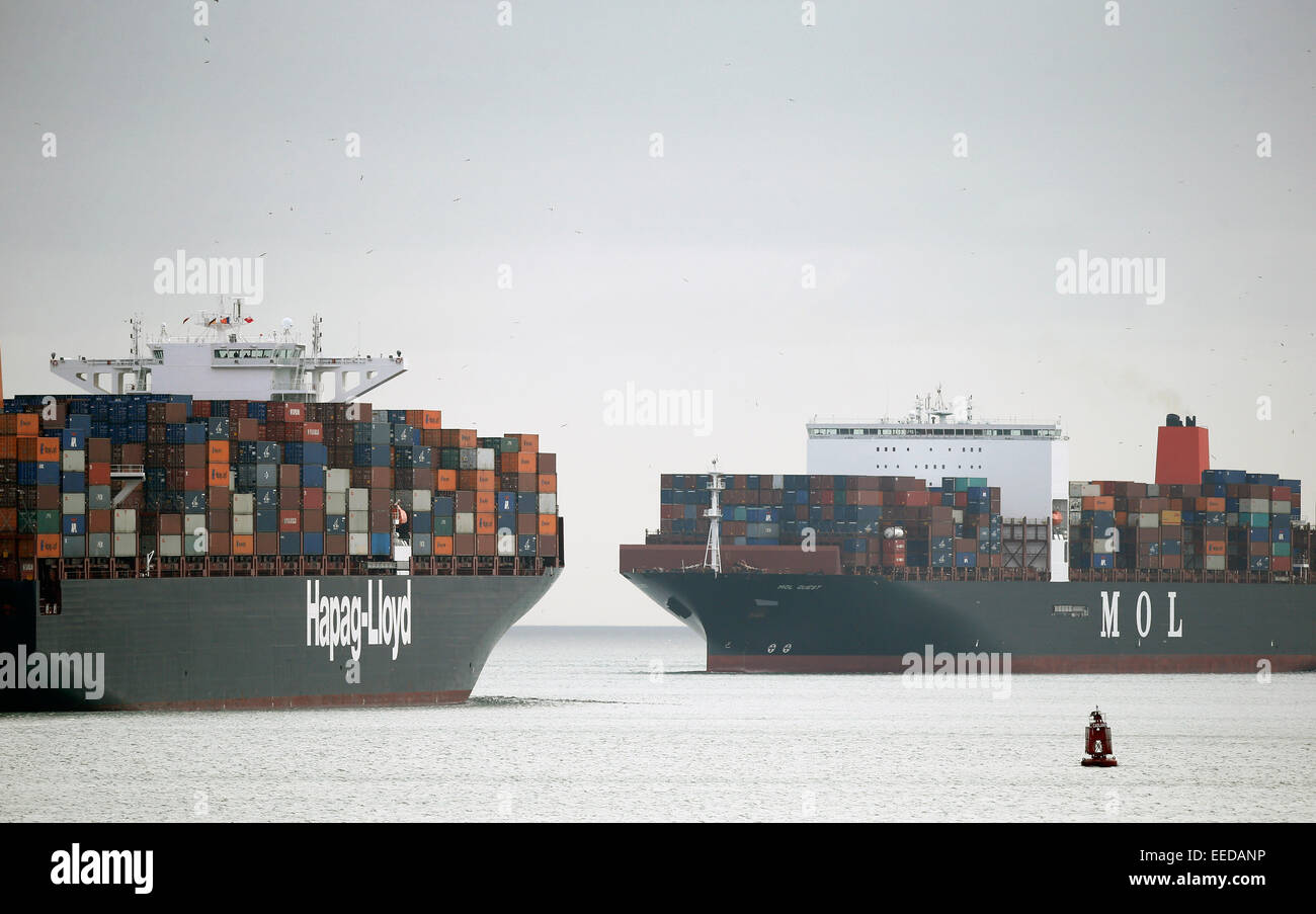 Container ships are seen in the Solent after leaving Southampton Docks