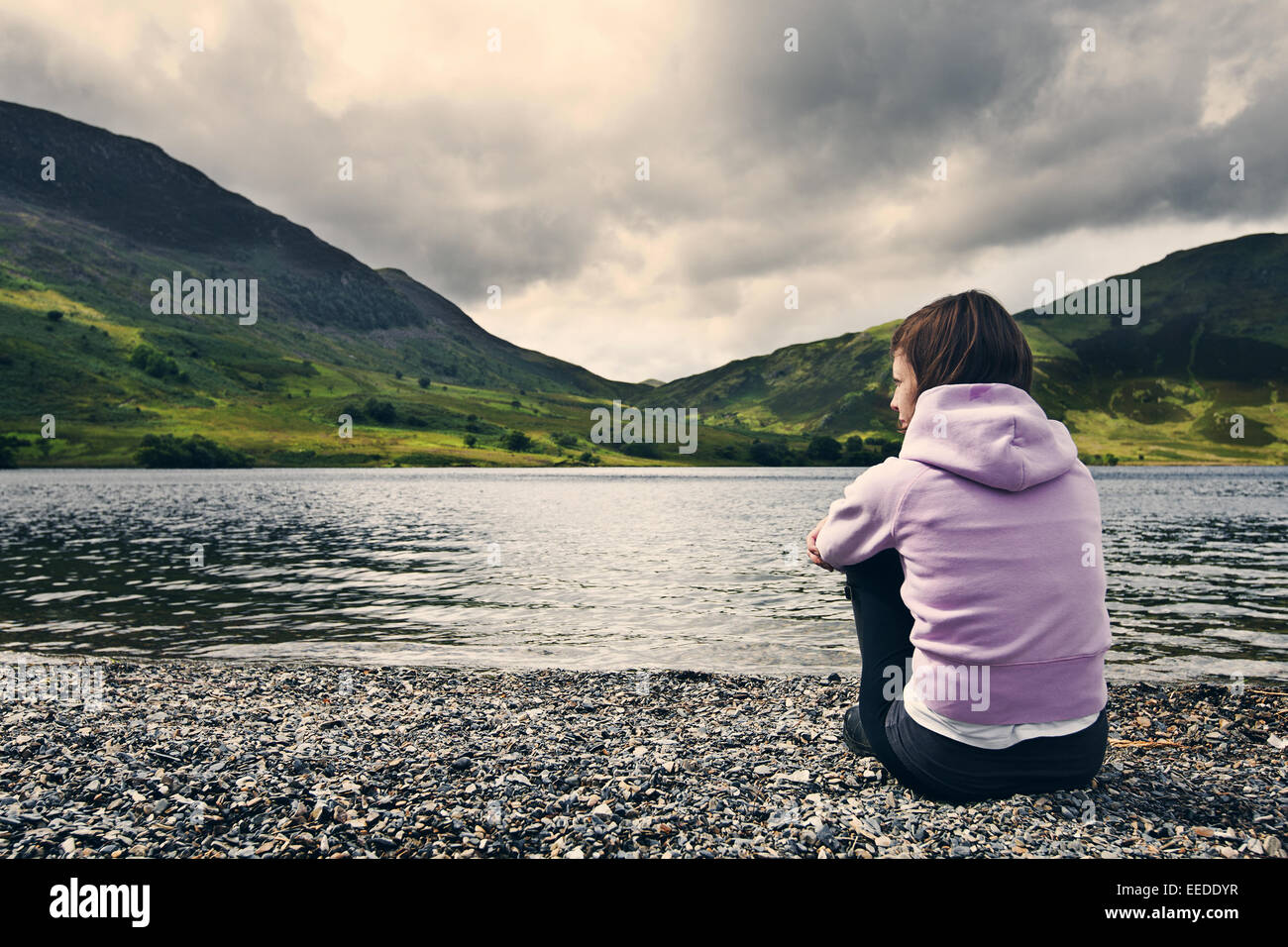 Woman by Crummock Water, Lake District. Stock Photo