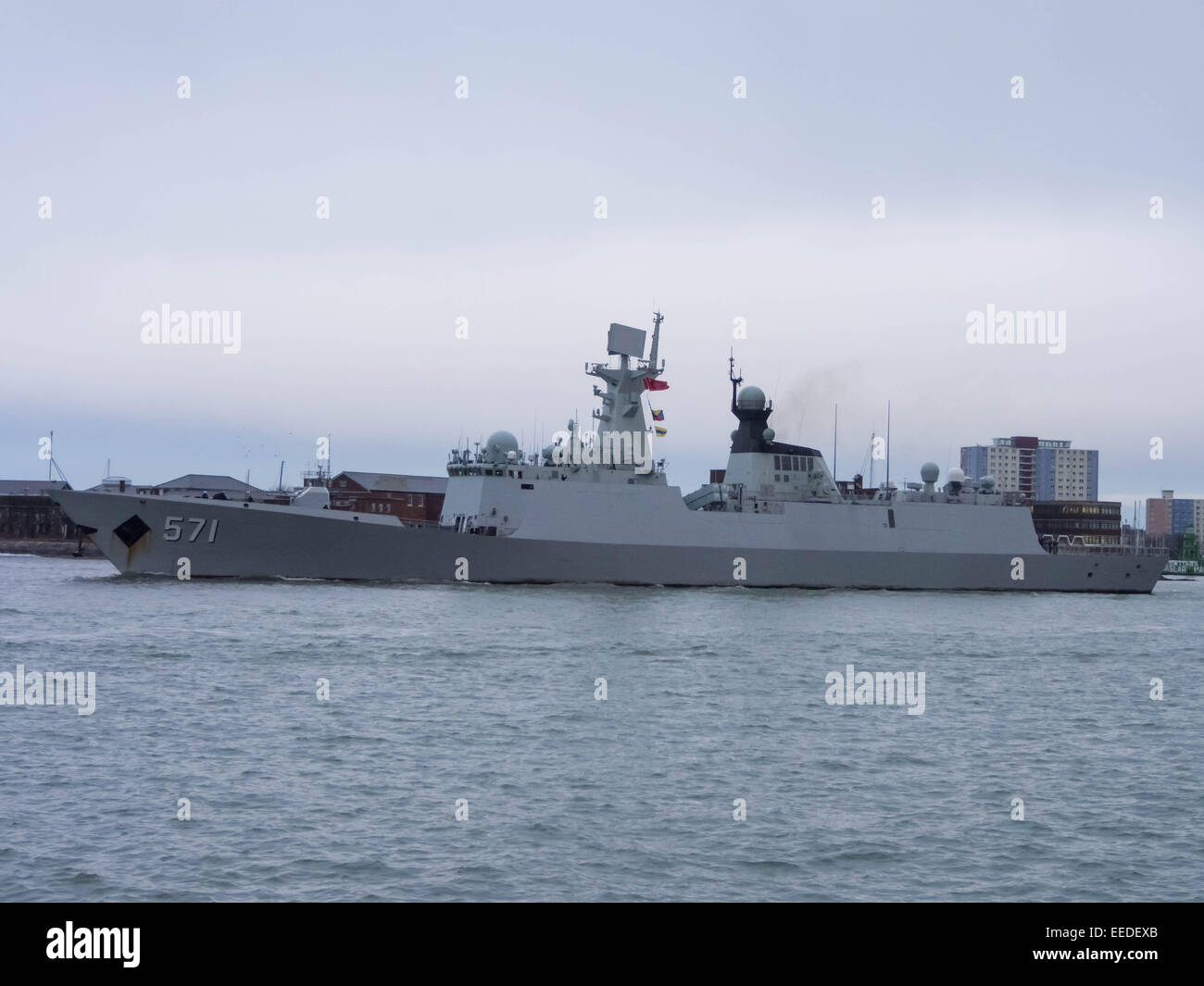 Portsmouth, England, 16th January 2015.The frigate Yun Cheng of the People's Liberation Army Navy leaves Portsmouth Harbour after a 5 day visit aimed at enhancing military understanding between the UK and China. The frigate Yun Chenga was accompanied by the assault ship Chang Bai Shan  and the replenishment ship Chaohu. Credit:  simon evans/Alamy Live News Stock Photo