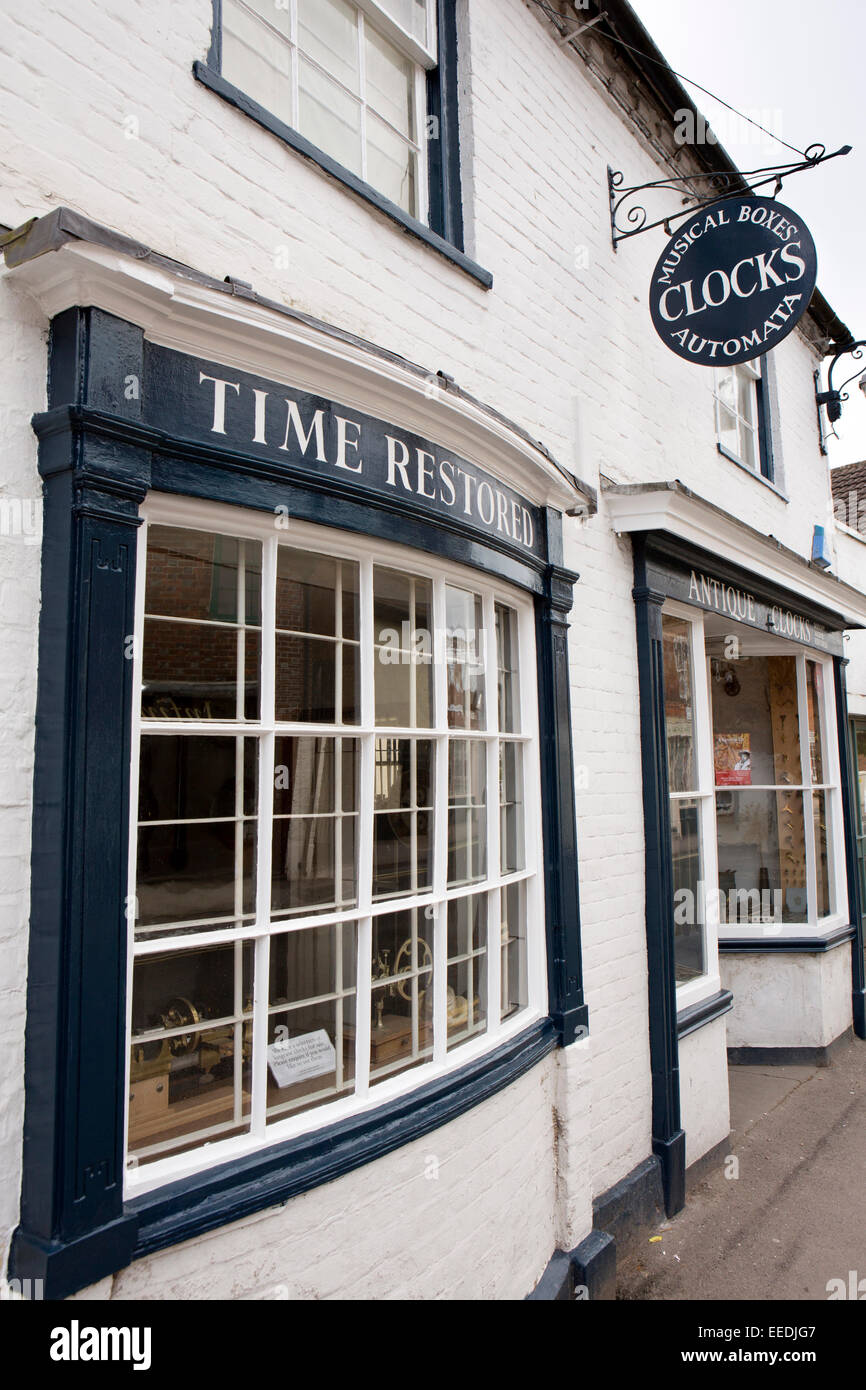 UK, England, Wiltshire, Pewsey, High Street, Time Restored clock dealer and repairer Stock Photo