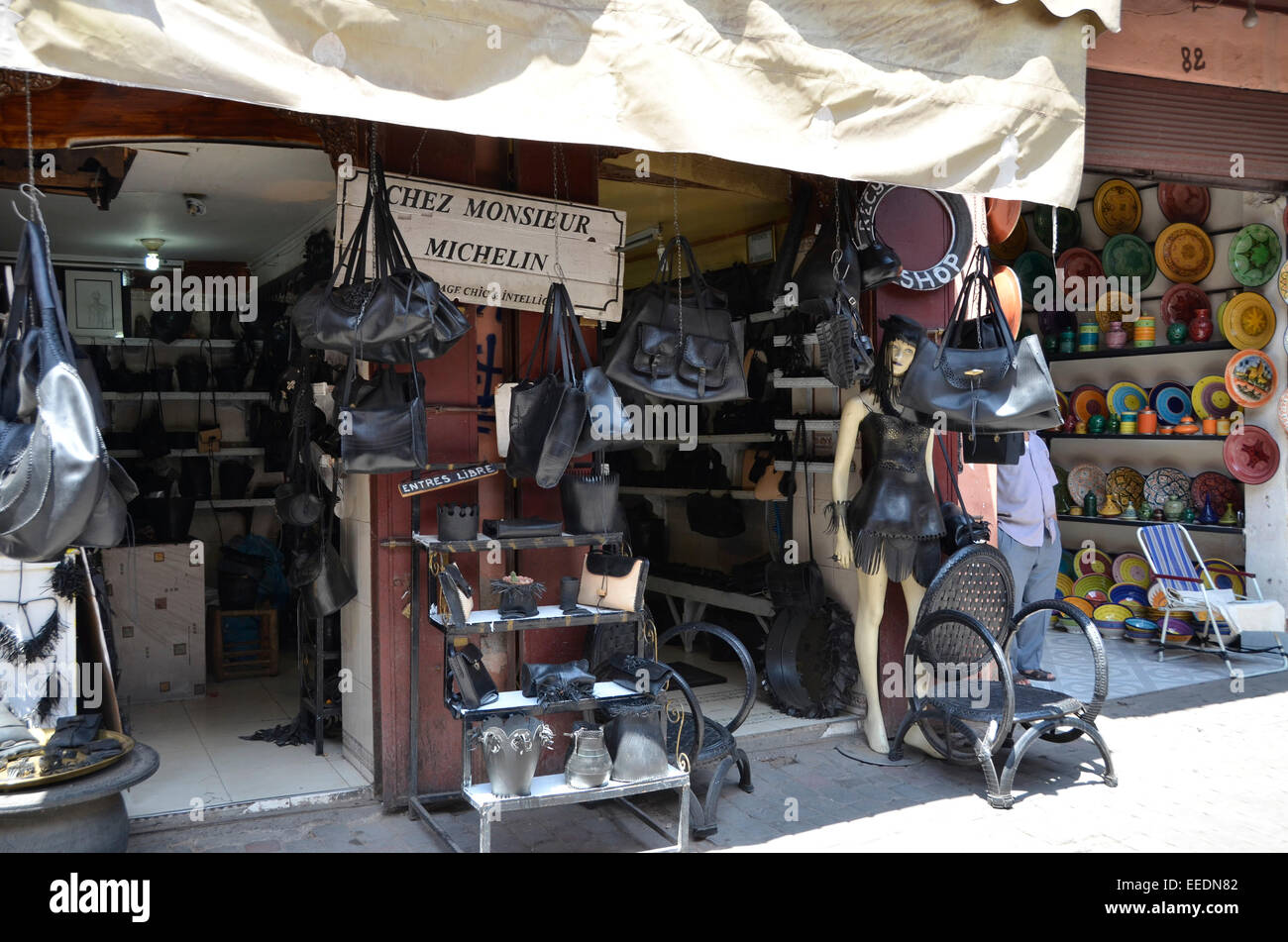 Shop in the Marrakech Marrakesh market souk selling goods of recycled rubber tires Stock Photo