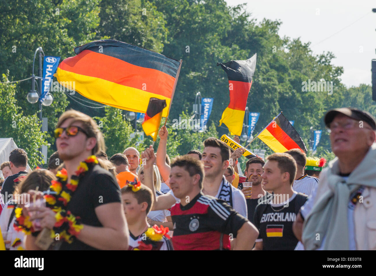 Fans celebrating at Brandenburg Gate the German football team at the FIFA World Cup in Brazil, Berlin, Germany Stock Photo