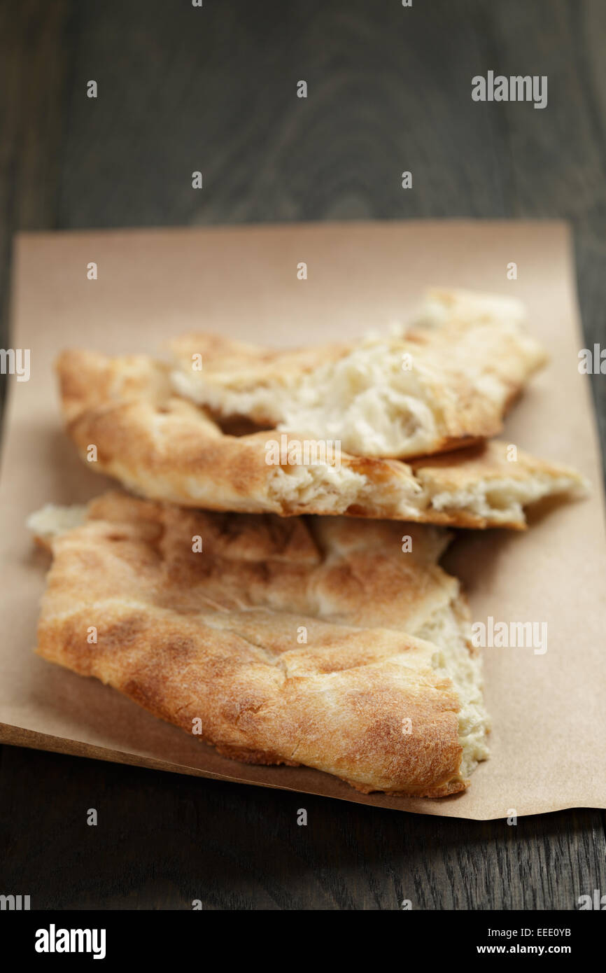 Freshly-baked pita bread in the oven – License Images – 957715 ❘ StockFood