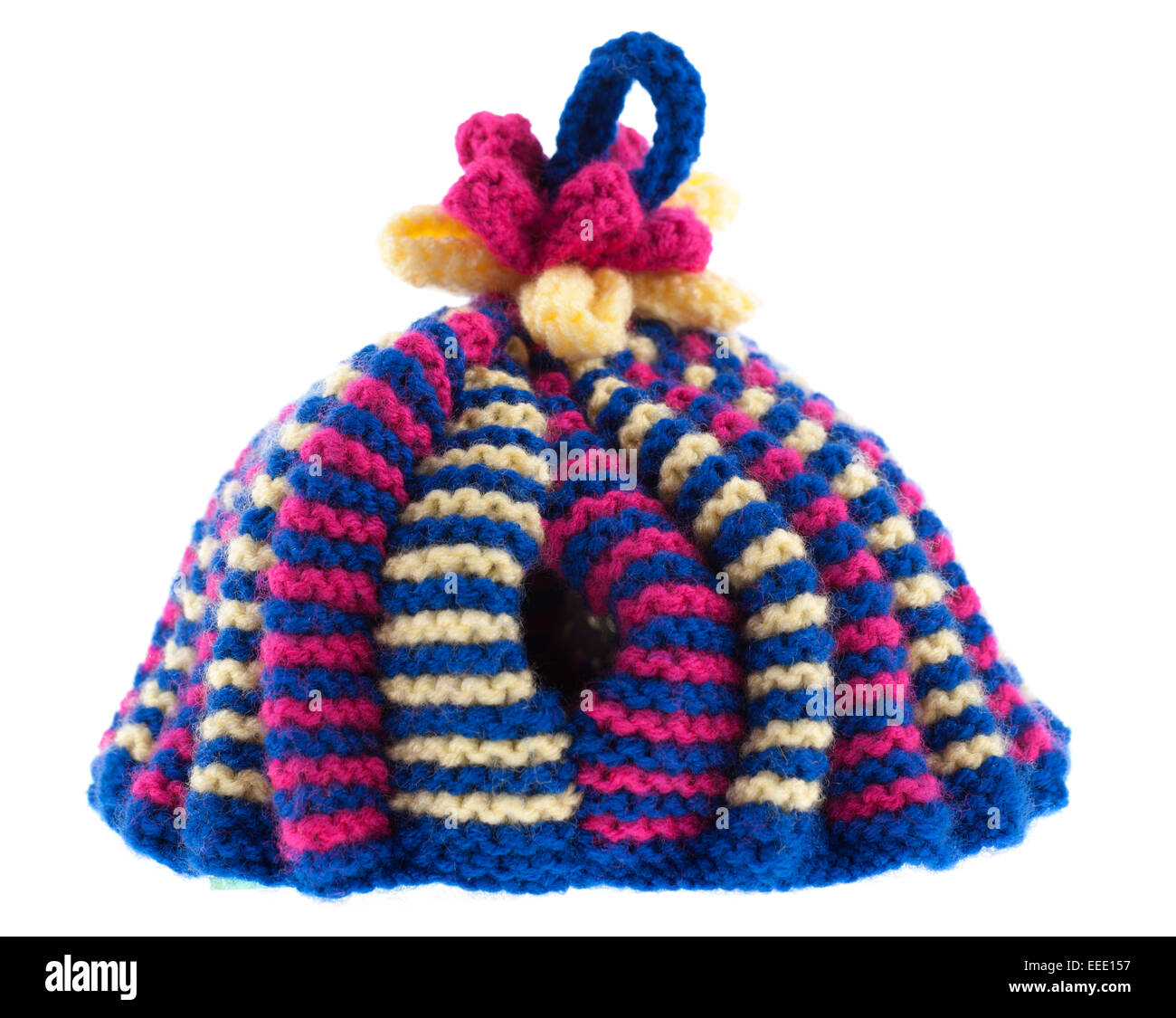 Knitted wool teapot cosy Stock Photo
