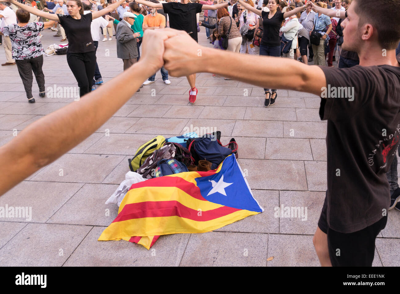 Catalans dancing their traditional Sardana with the flag of the Catalan independence movement 4.10.2014 Stock Photo