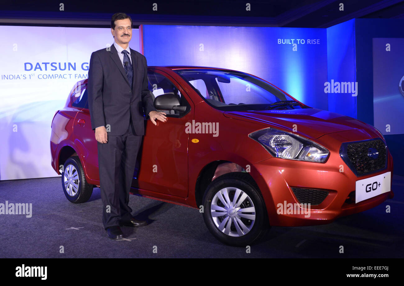 (150116) -- NEW DELHI, Jan. 16, 2015 (Xinhua) -- Managing Director of Nissan Motor India Pvt. Ltd Arun Malhotra presents the new 'Datsun Go+' during the launch of the car in New Delhi, India, Jan. 16, 2015. (Xinhua/Partha Sarkar) Stock Photo