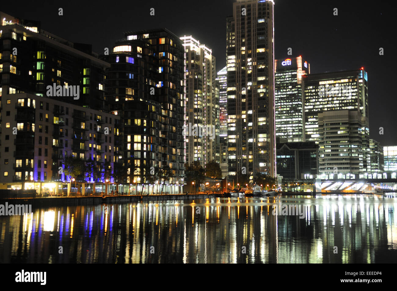 London Canary Wharf at night, reflections in Millwall Inner Dock Stock Photo