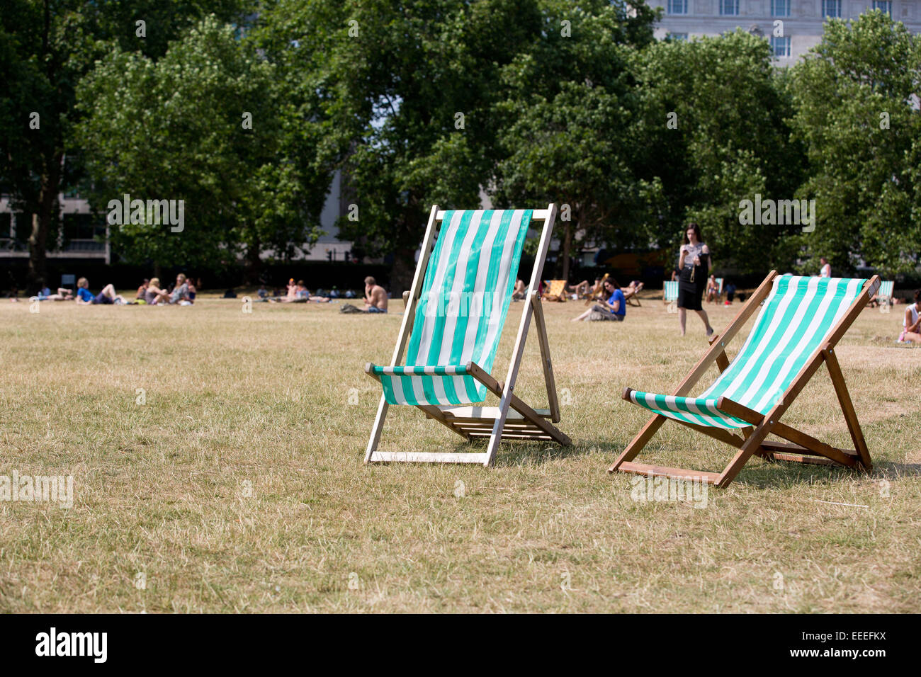 Deck chairs in Green Park Stock Photo