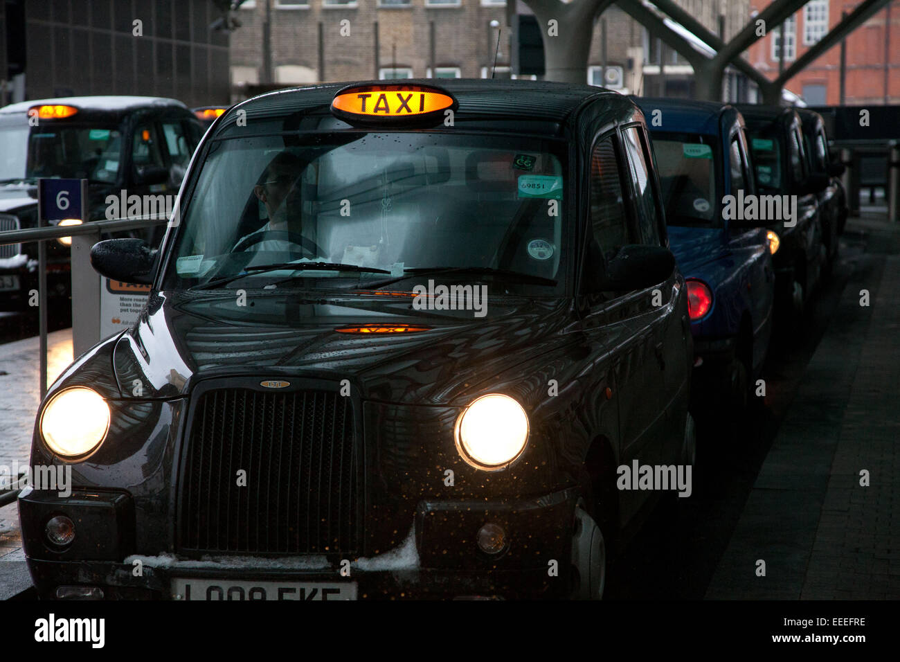 Taxi rank in the wintertime Stock Photo