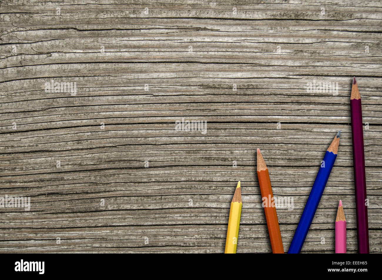Colored Pencils On Wooden School Desk Stock Photo Alamy